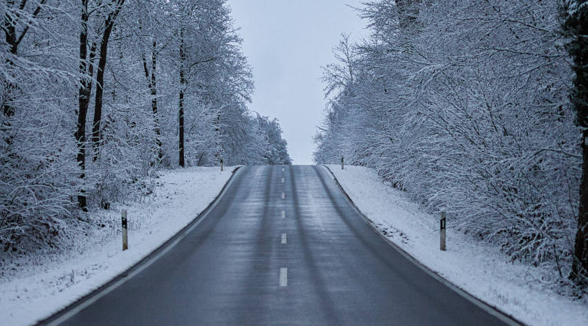 An image showing a cold lonely road in the winter time